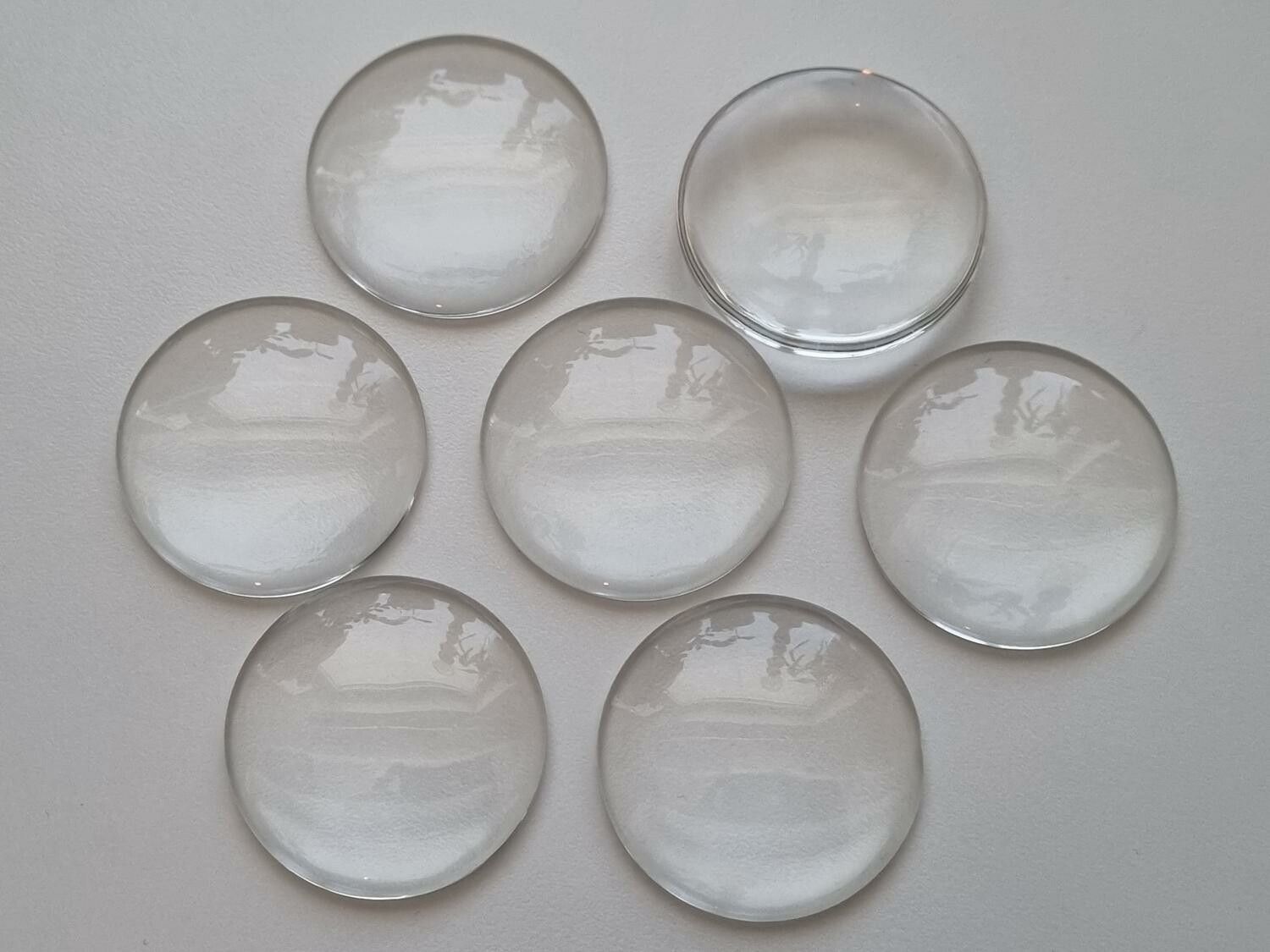 1 stor transparent cabochon i glas, glasinfattning (40 mm)