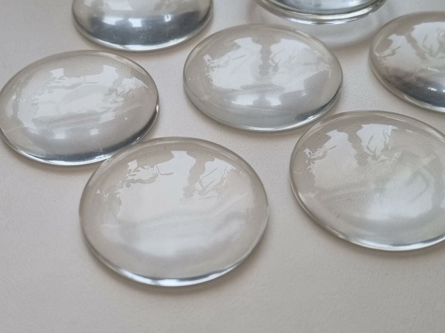 1 stor transparent cabochon i glas, glasinfattning (40 mm)