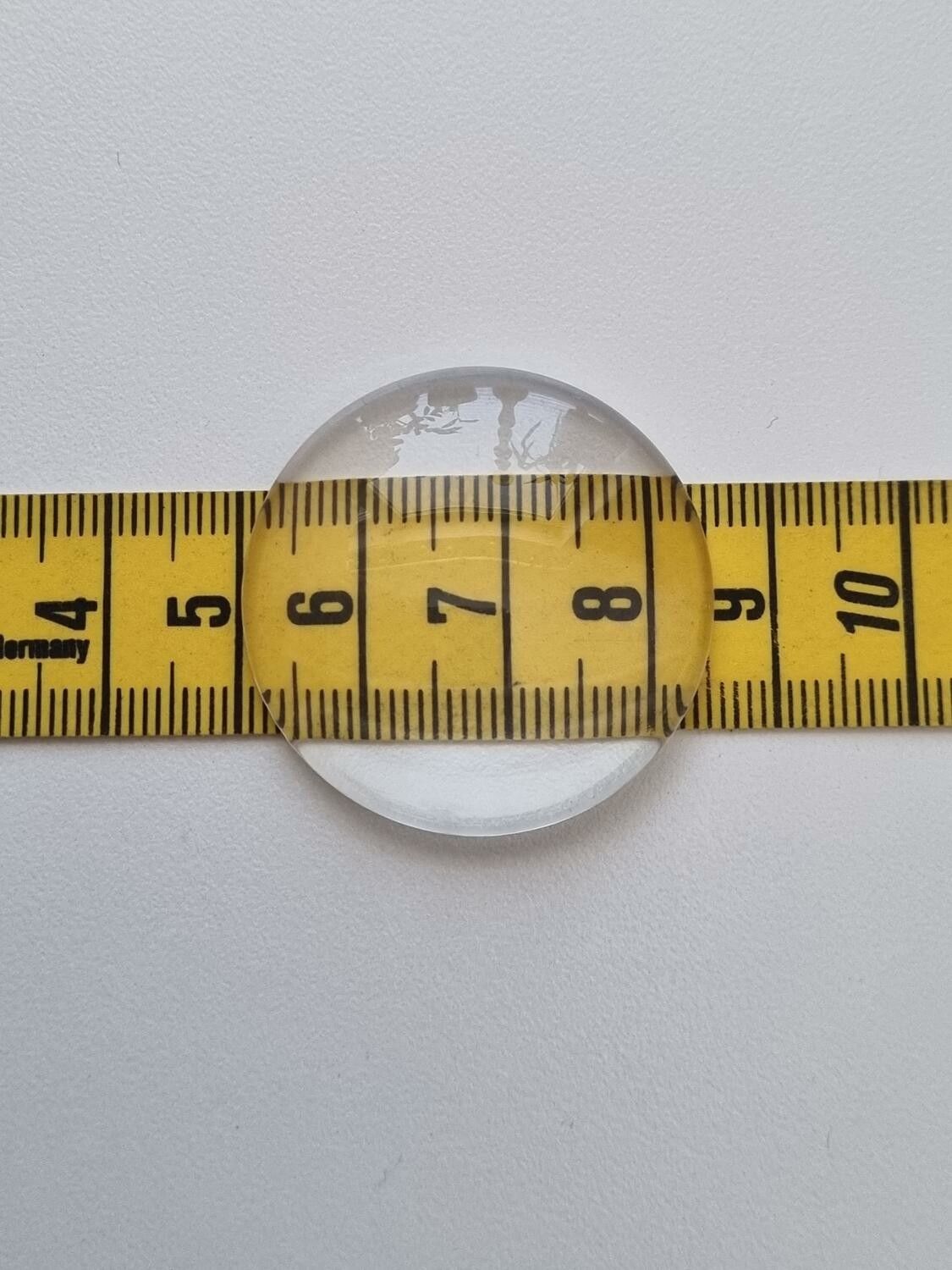 1 stor transparent cabochon i glas, glasinfattning (35 mm)