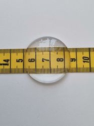 1 stor transparent cabochon i glas, glasinfattning (35 mm)