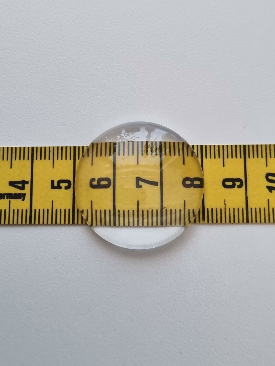 2 st transparenta cabochoner i glas, glasinfattningar (30 mm)
