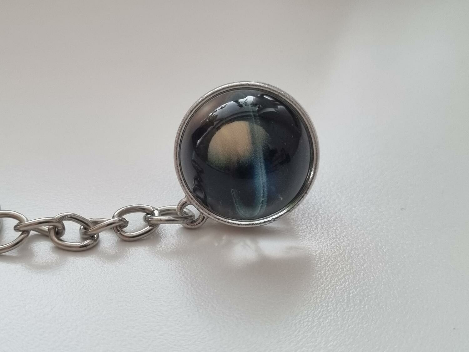 Nyckelring galax planet i rostfritt stål - Saturnus