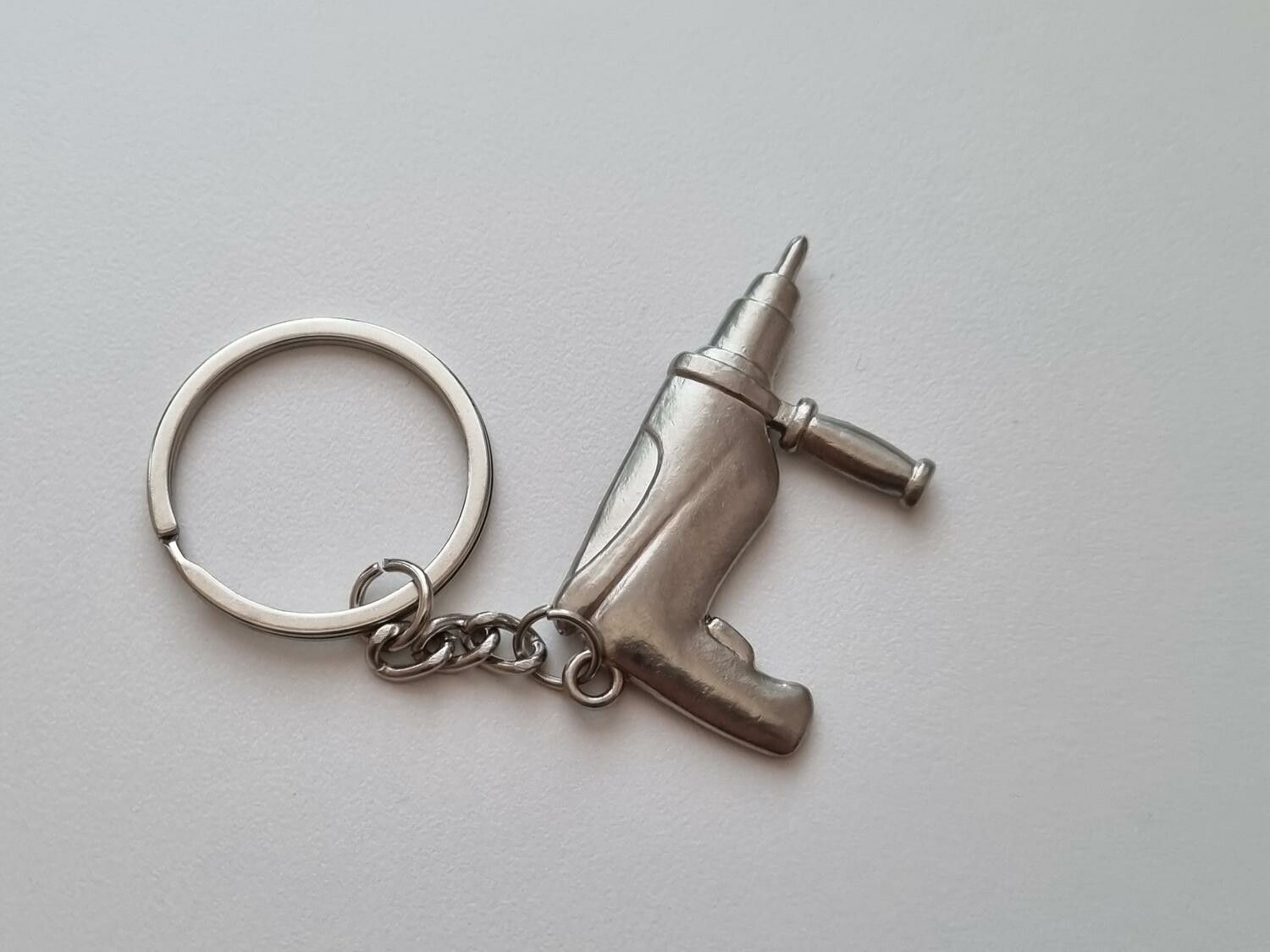 Nyckelring Borr hänge miniatyr i rostfritt stål