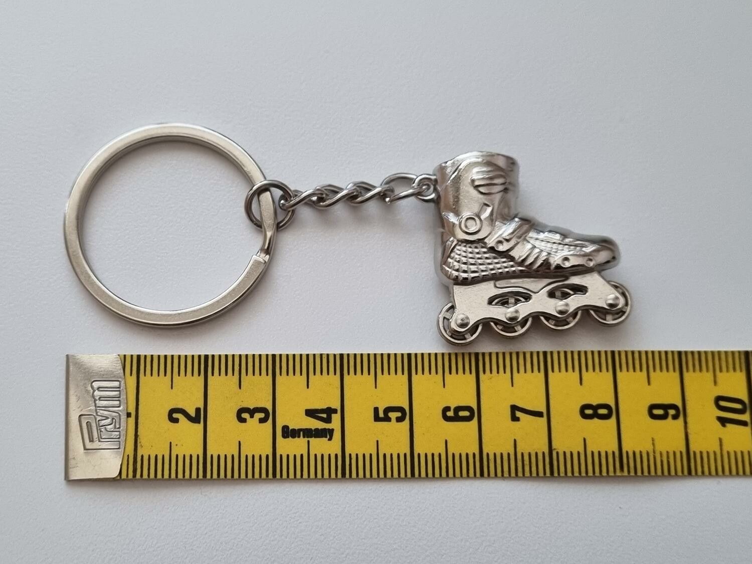 Nyckelring Inlines rullskridskor hänge miniatyr i rostfritt stål