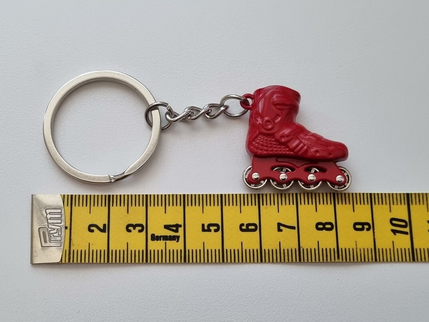 Nyckelring Inlines rullskridskor hänge miniatyr i rostfritt stål
