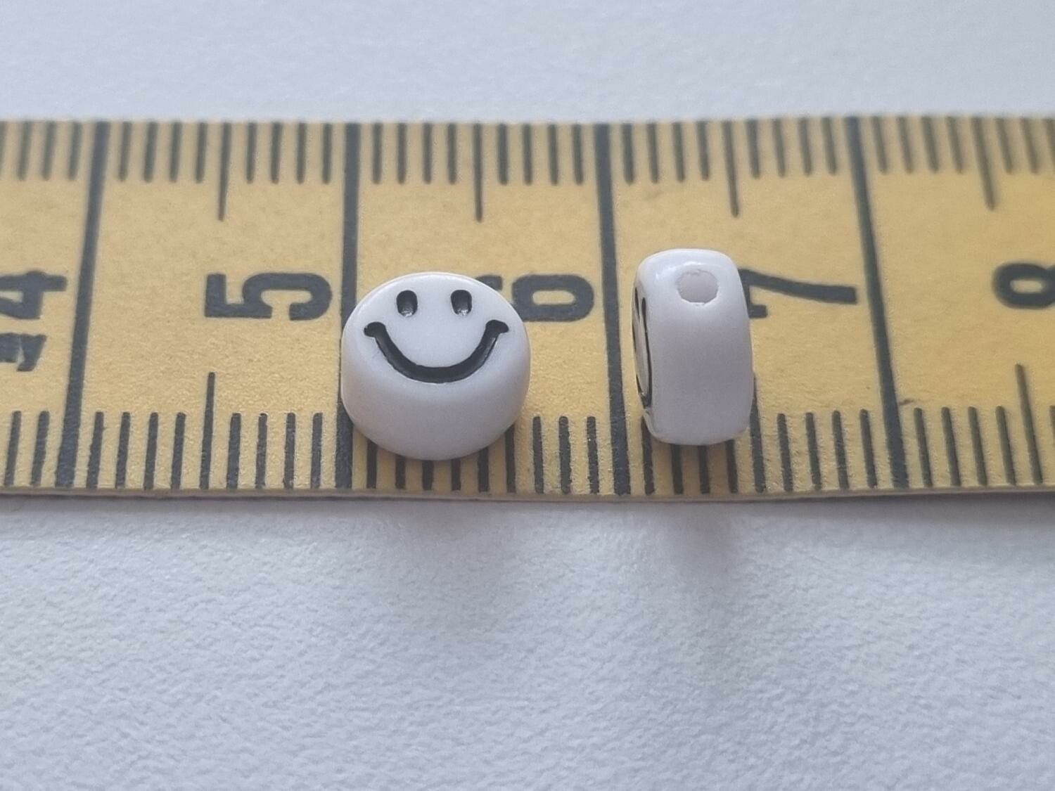 50 st pärlor smiley Smileypärlor (6 mm i diameter)