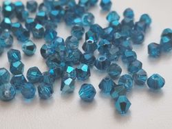 100 st blå bicone pärlor (4 mm)