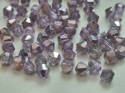 100 st bicone pärlor (4 mm) - Lilafärgade