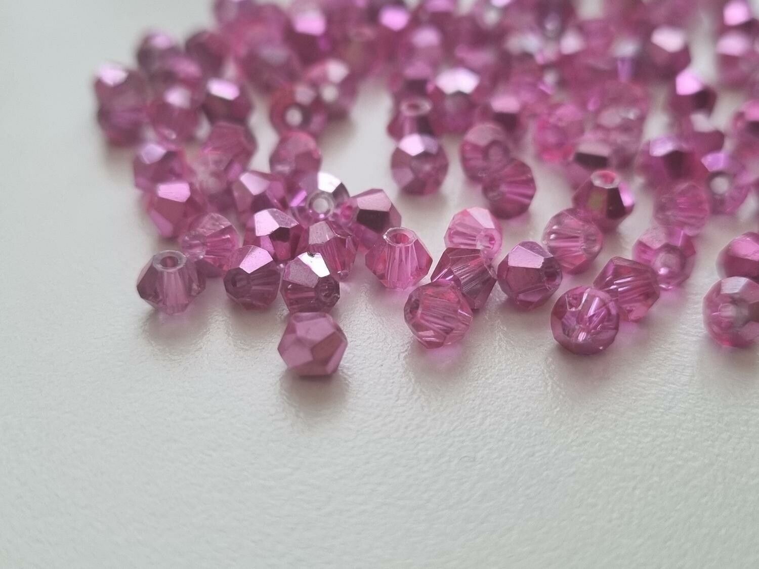 100 st bicone pärlor (4 mm) i rose/cerisefärg