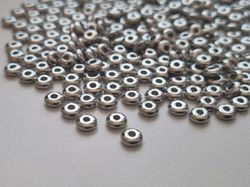 200 st silverfärgade pärlor spacer beads i fin lyser (5 mm)