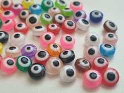 50 st pärlor, spacer beads, ögon i varierande vackra färger (8 mm)