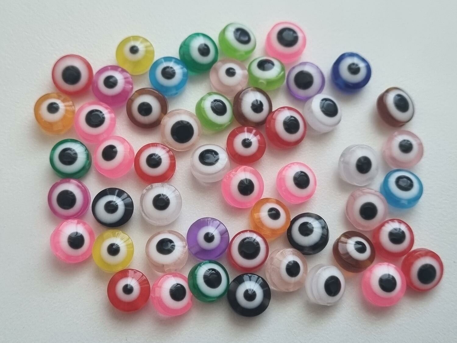 50 st pärlor, spacer beads, ögon i varierande vackra färger (8 mm)