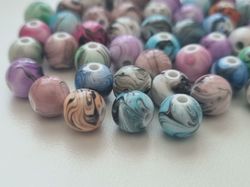 50 st pärlor i varierande vackra färger (8 mm)