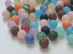 100 st pärlor i varierande vackra färger (6 mm)