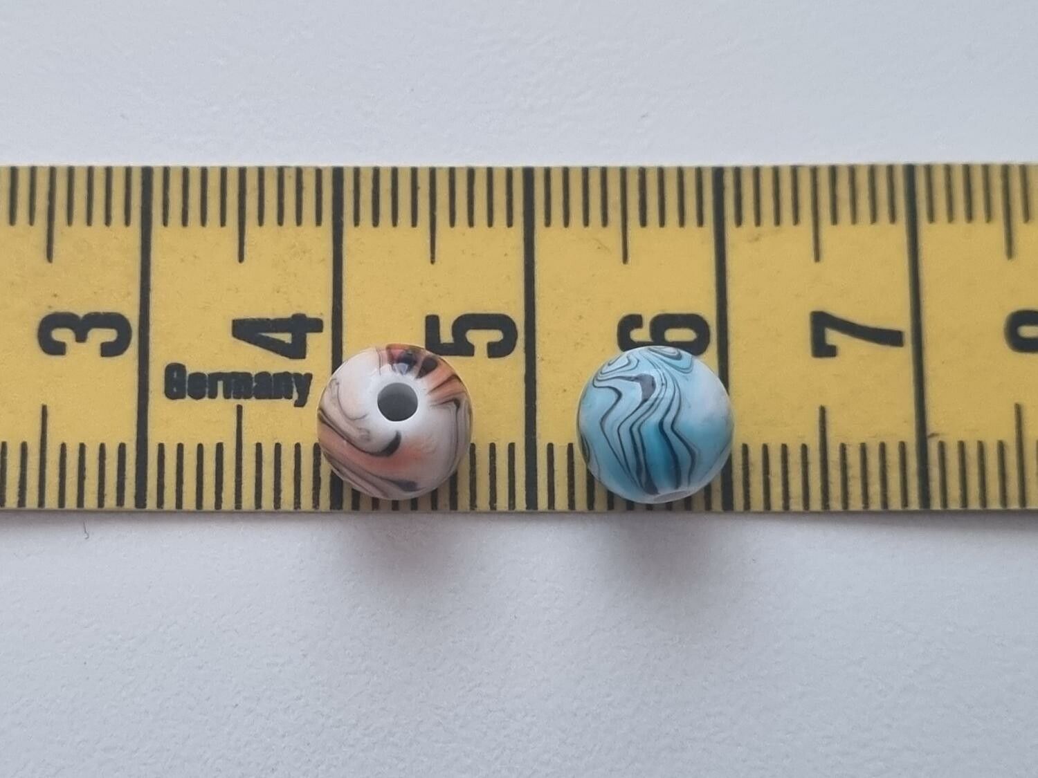 50 st pärlor i varierande vackra färger (8 mm)