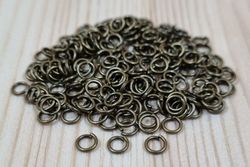 100 st jumprings / bindringar (4 mm, bronsfärgade)