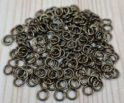 100 st jumprings / bindringar (4 mm, bronsfärgade)