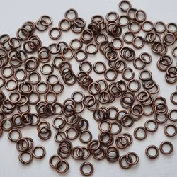 100 st jumprings / bindringar (4 mm, kopparfärgade)