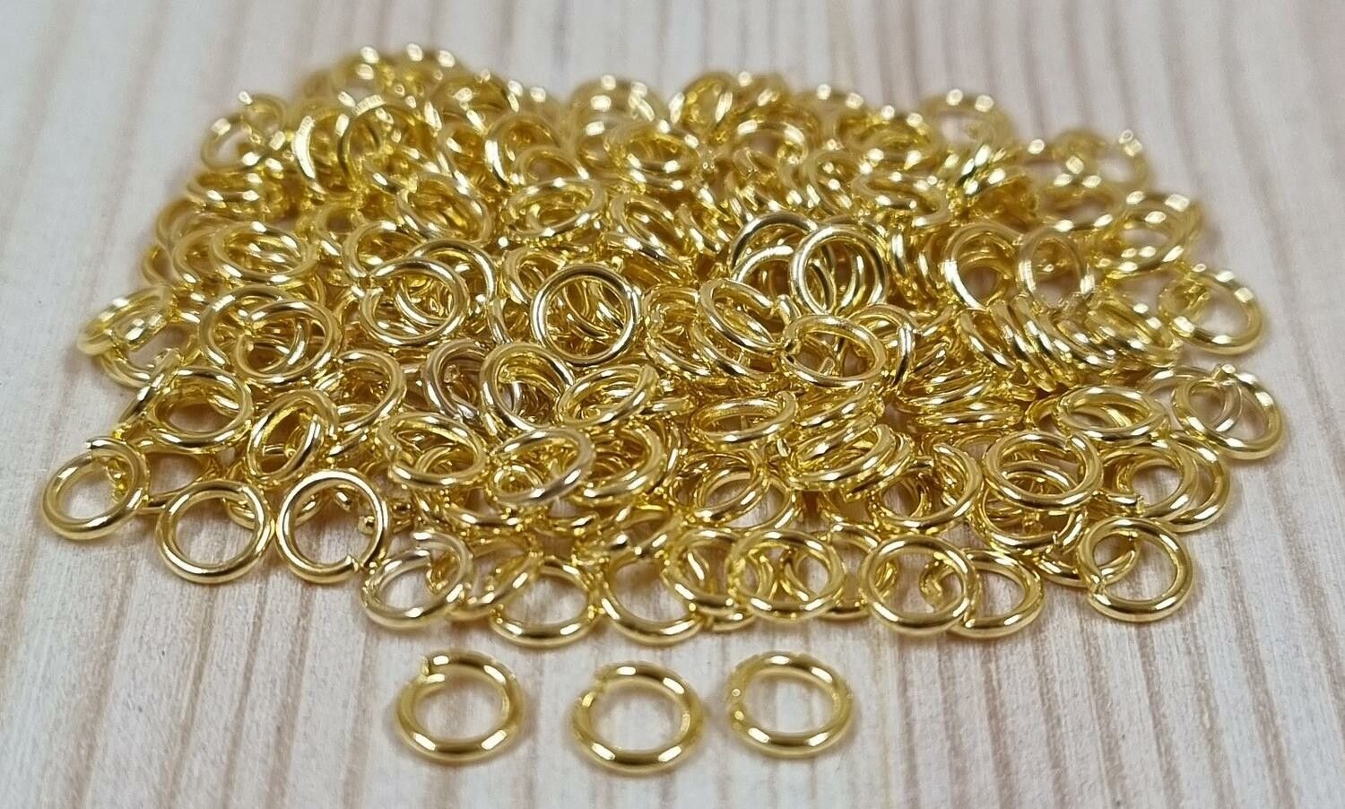100 st jumprings / bindringar (4 mm, guldfärgade)