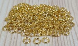 100 st jumprings / bindringar (4 mm, guldfärgade)