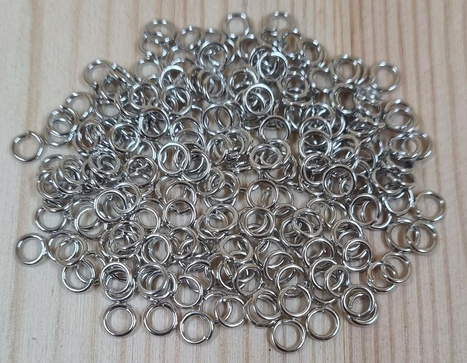 100 st jumprings / bindringar (4 mm, silverfärgade)