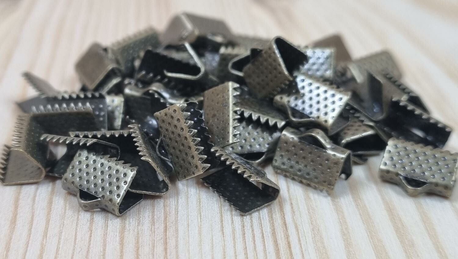 10 st bronsfärgade lås klämmor (10 mm)