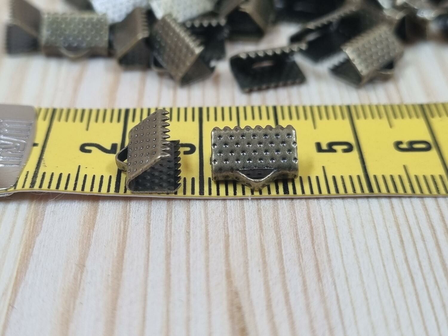 10 st bronsfärgade lås klämmor (10 mm)