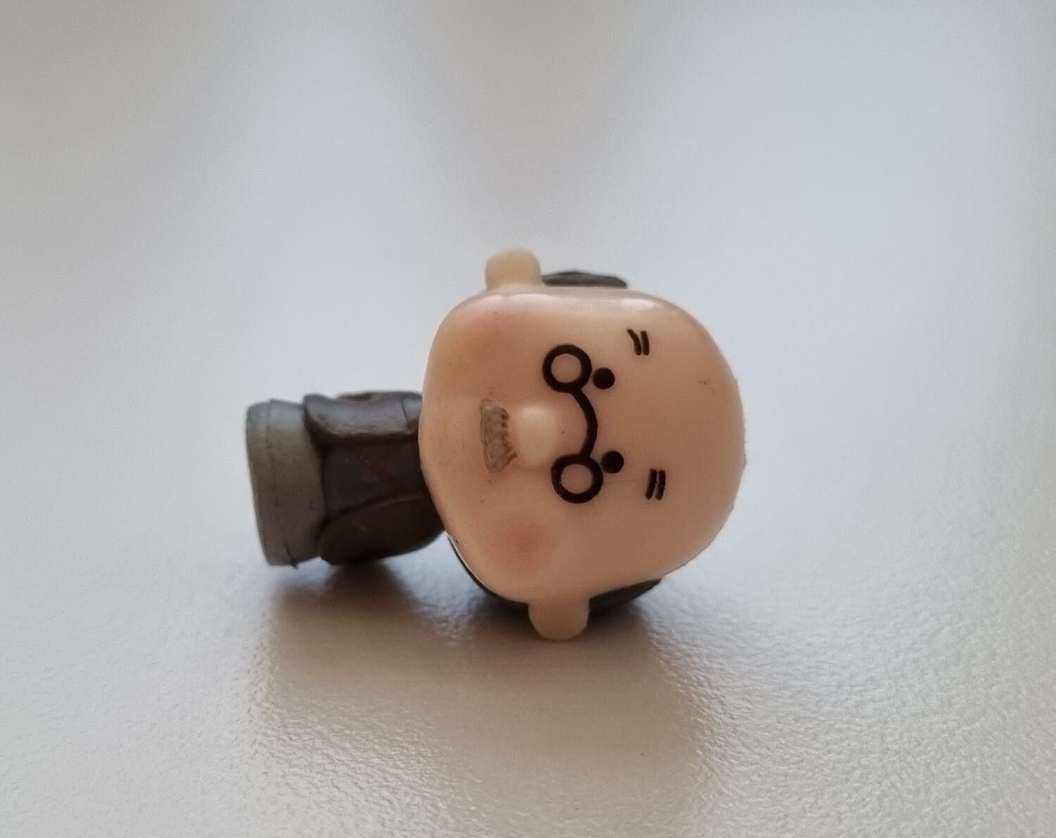 Miniatyr, figur - Funderande herre