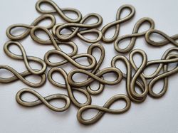 2 st Berlocker Charms Oändlighet / Infinity (Bronsfärgade)