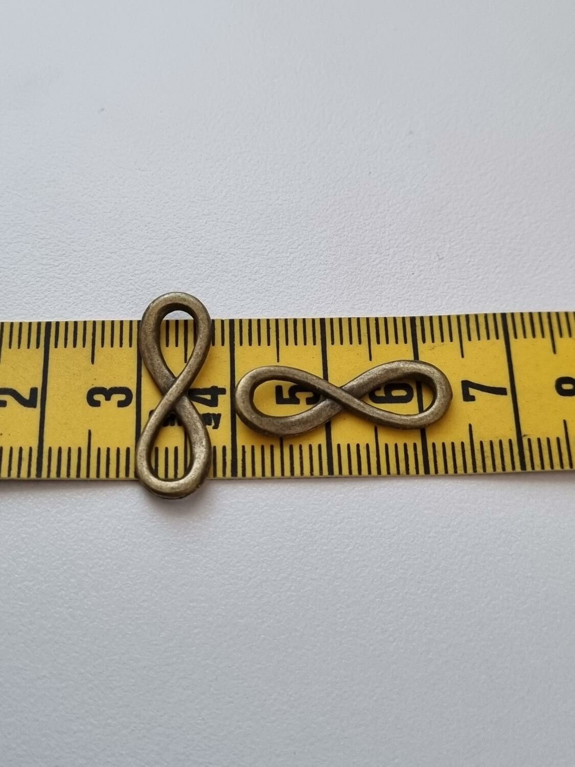 2 st Berlocker Charms Oändlighet / Infinity (Bronsfärgade)