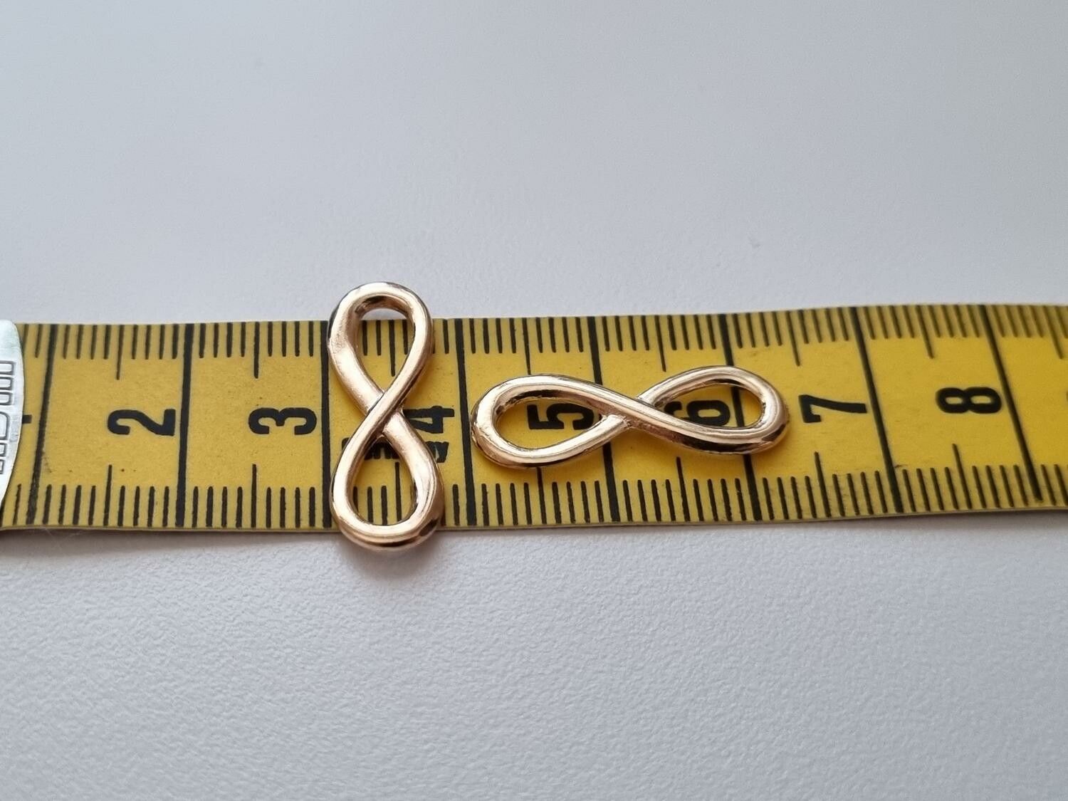 2 st Berlocker Charms Oändlighet / Infinity (Guldfärgade)