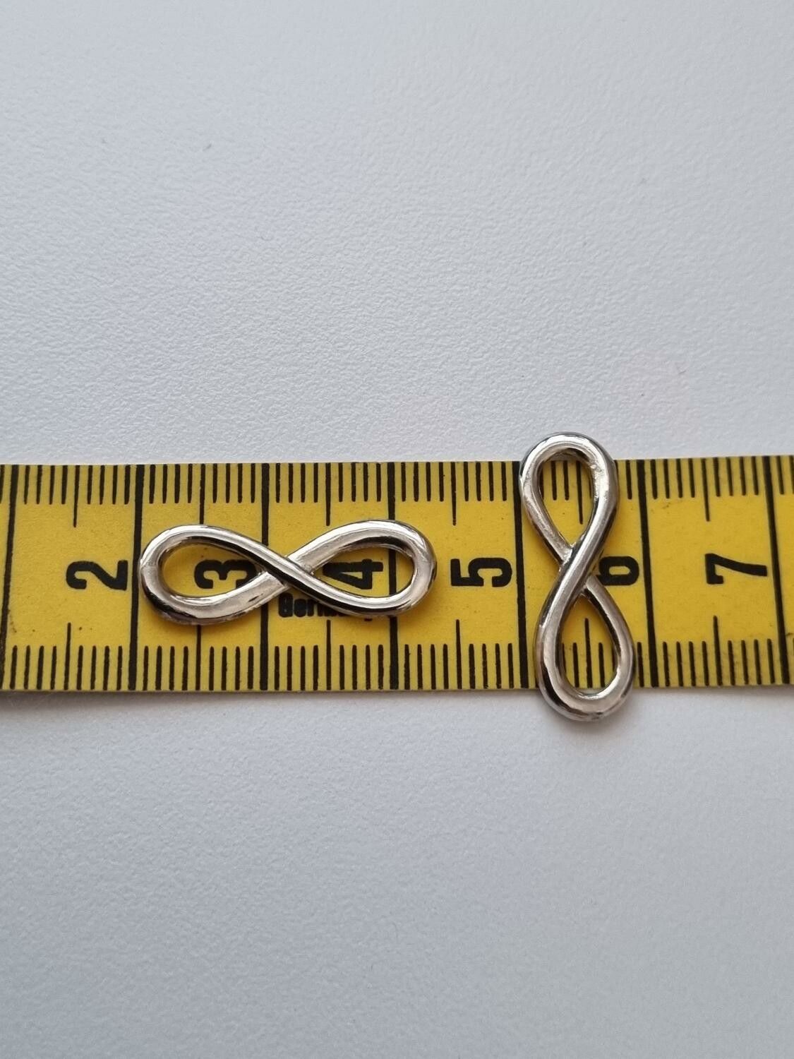 2 st Berlocker Charms Oändlighet / Infinity (Silverfärgade)