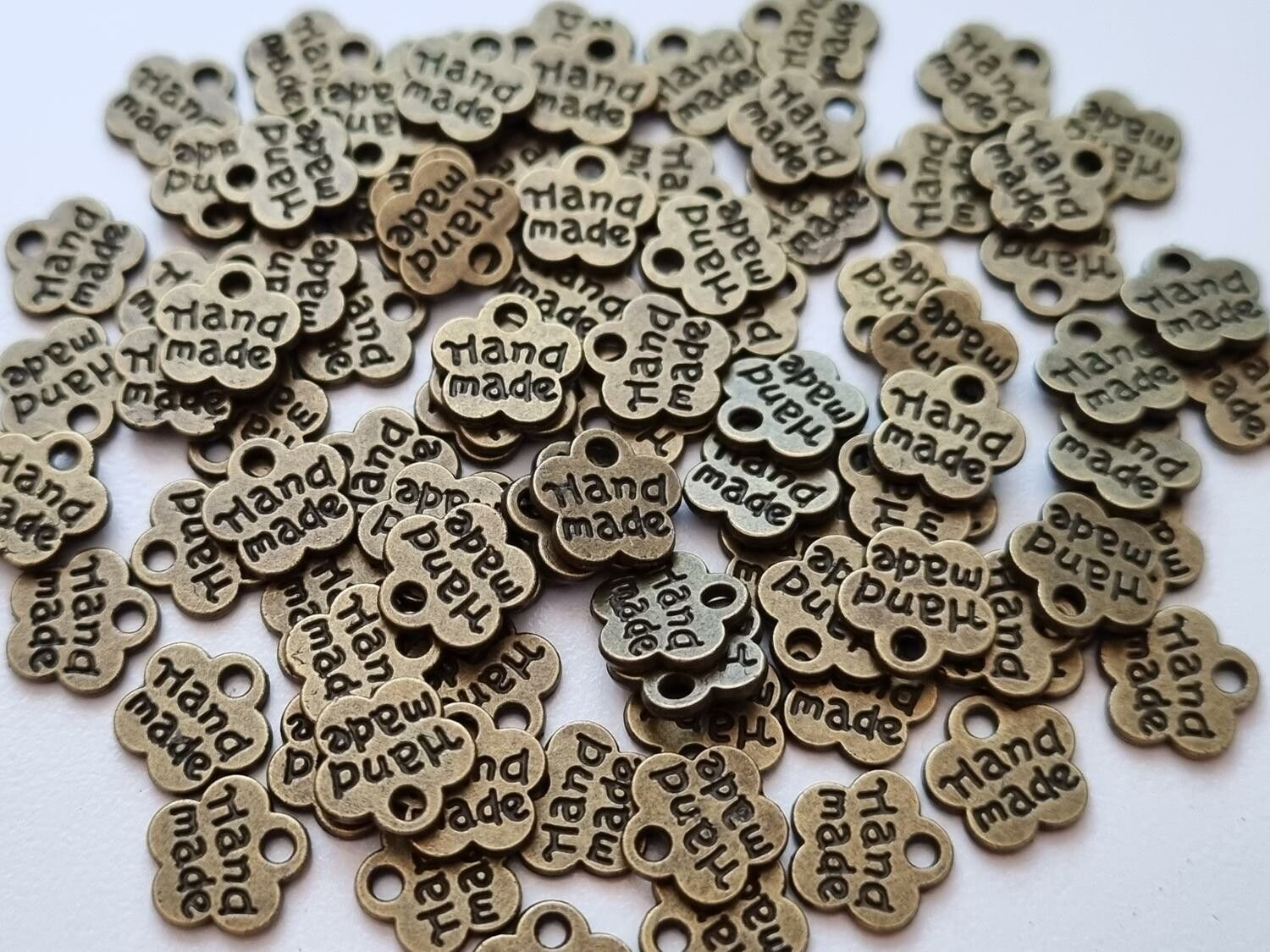 Berlocker charms Hand made - 10 st bronsfärgade