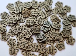 Berlocker charms Hand made - 10 st bronsfärgade