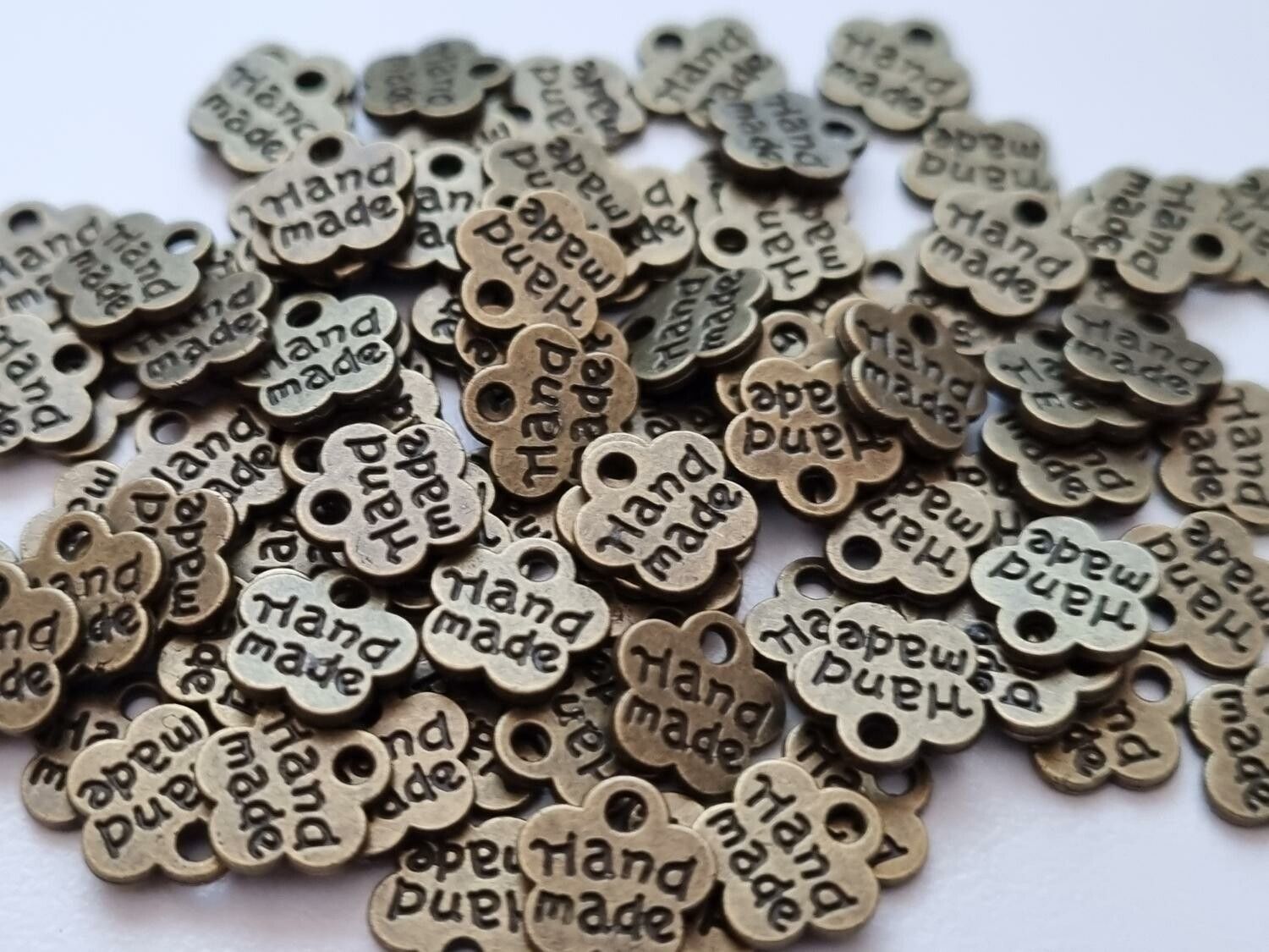 Berlocker charms Hand made - 10 st bronsfärgade
