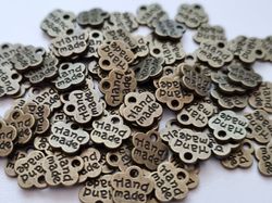 Berlocker charms Hand made - 10 st bronsfärgade