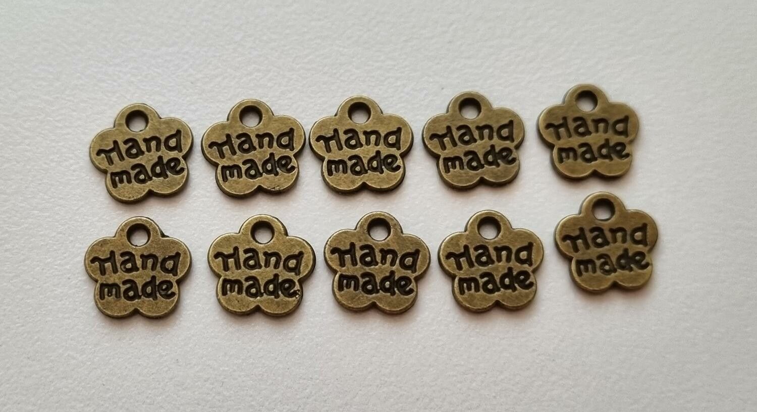 Berlocker charms Hand made - 10 st bronsfärgade