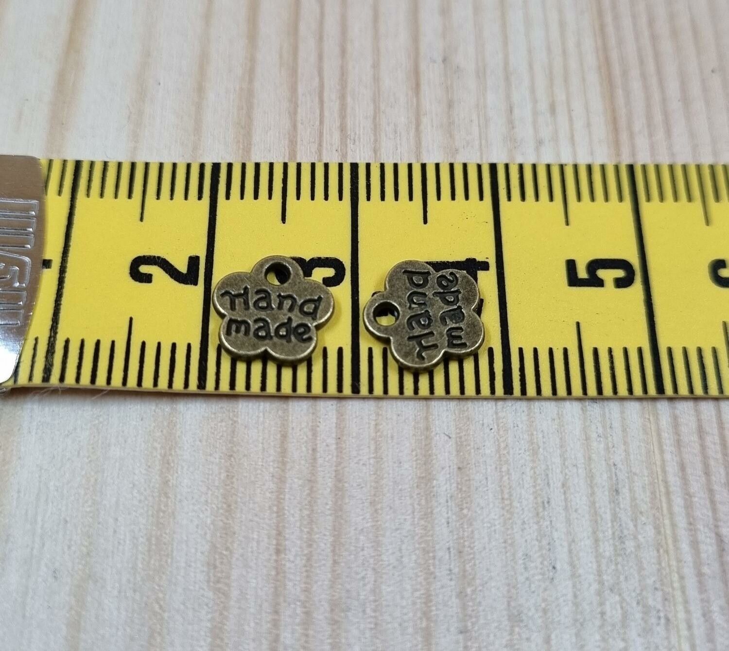 Berlocker charms Hand made - 10 st bronsfärgade
