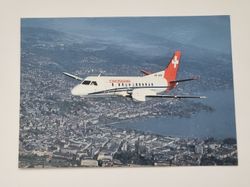 Vykort - Crossair's Cityline over Zurich, Saab Cityliner