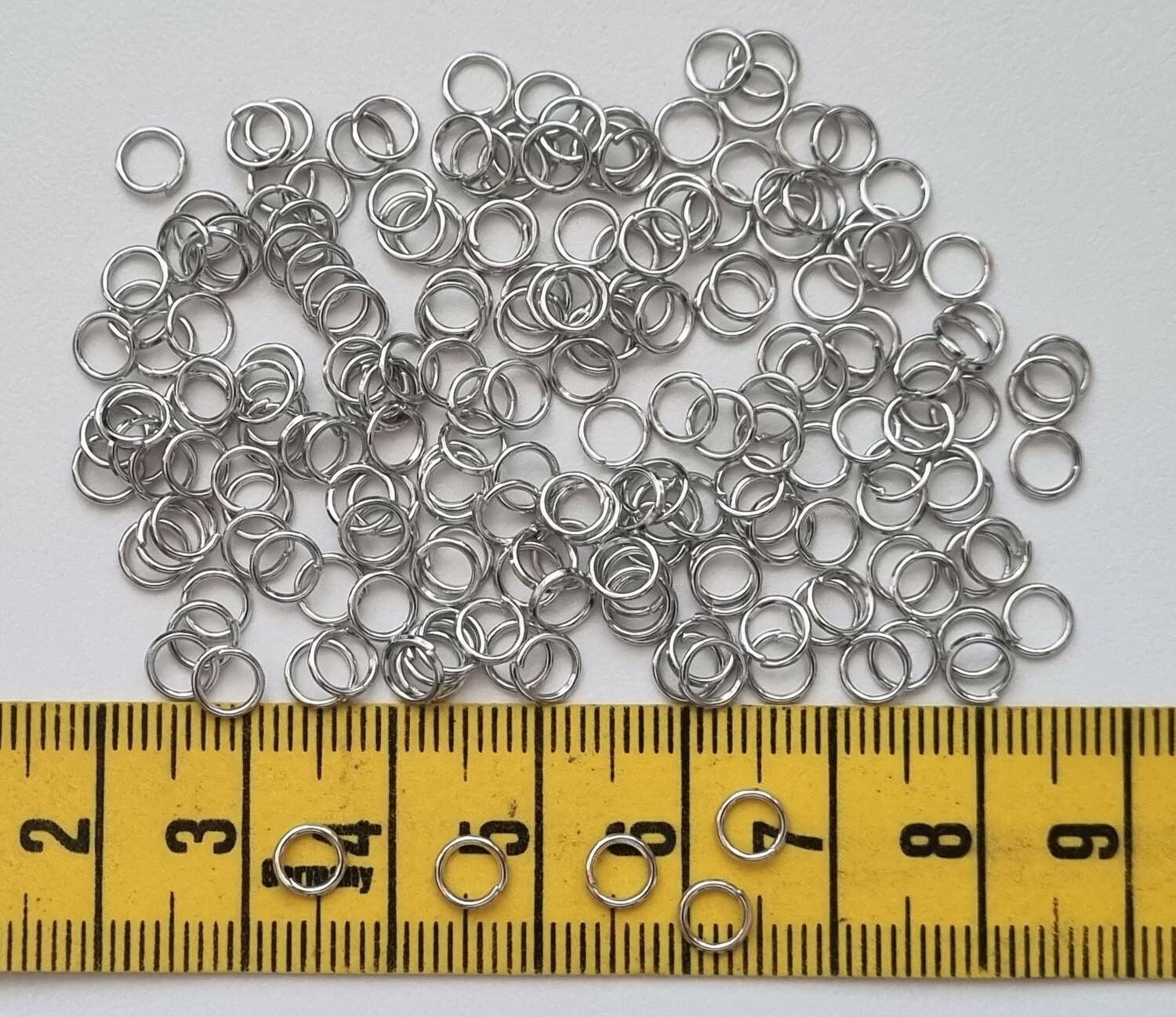 100 st jumprings / bindringar (5 mm, silverfärgade)