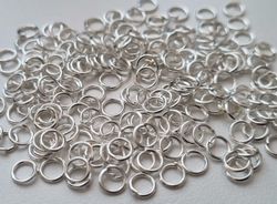 100 st jumprings / bindringar (5 mm, vita/ljus silver)