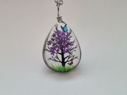 Halsband - Oval glasberlock med ett målat träd inuti (45 cm lång kedja)
