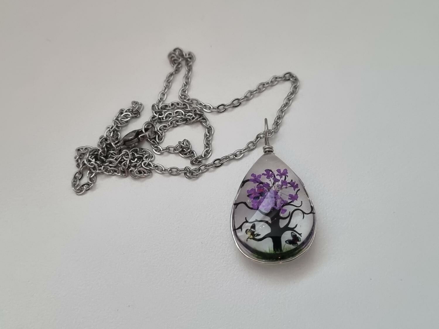 Halsband - Oval glasberlock med ett målat träd inuti (45 cm lång kedja)