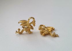 2 st guldfärgade drakar. Berlocker / charms