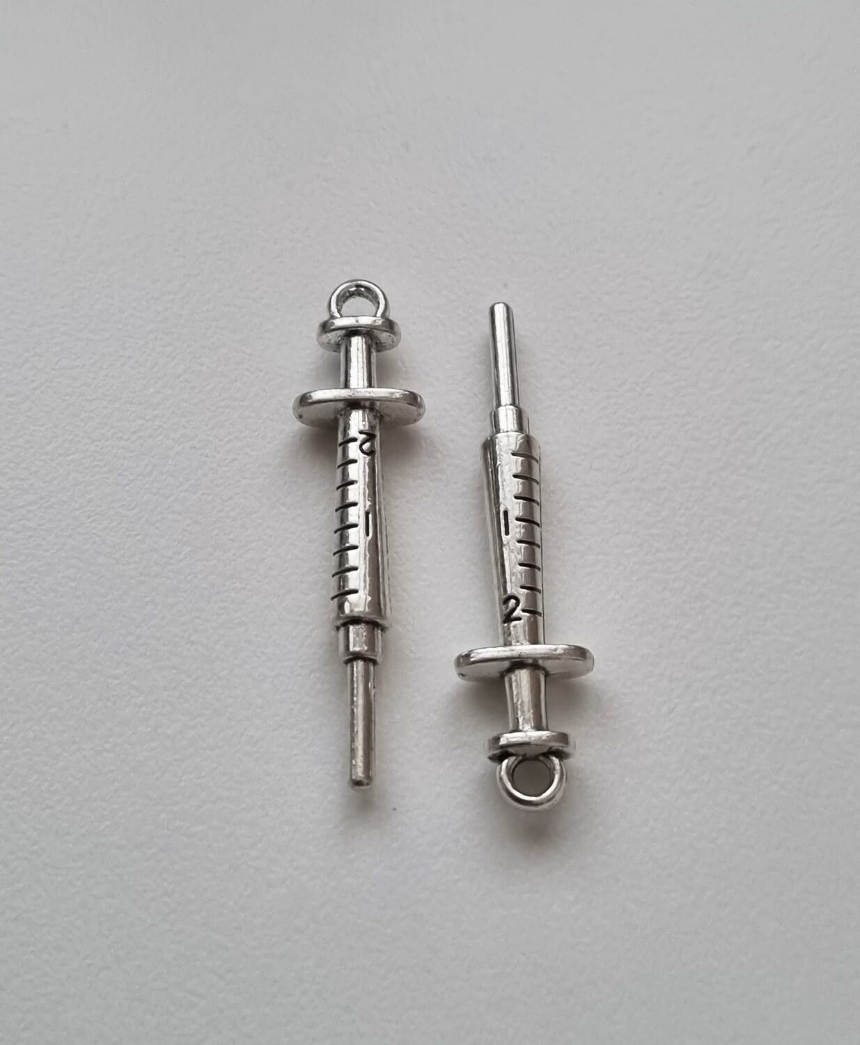 2 st sprutor. Berlocker / charms
