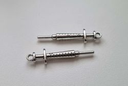 2 st sprutor. Berlocker / charms