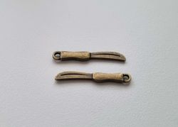 2 st smörknivar - Miniatyrer, berlocker / charms (bronsfärgade)