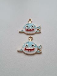 2 st blå hajar / berlocker / charms
