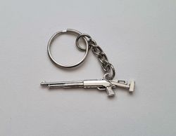 1 st Nyckelring - Silverfärgat hagelgevär / shotgun
