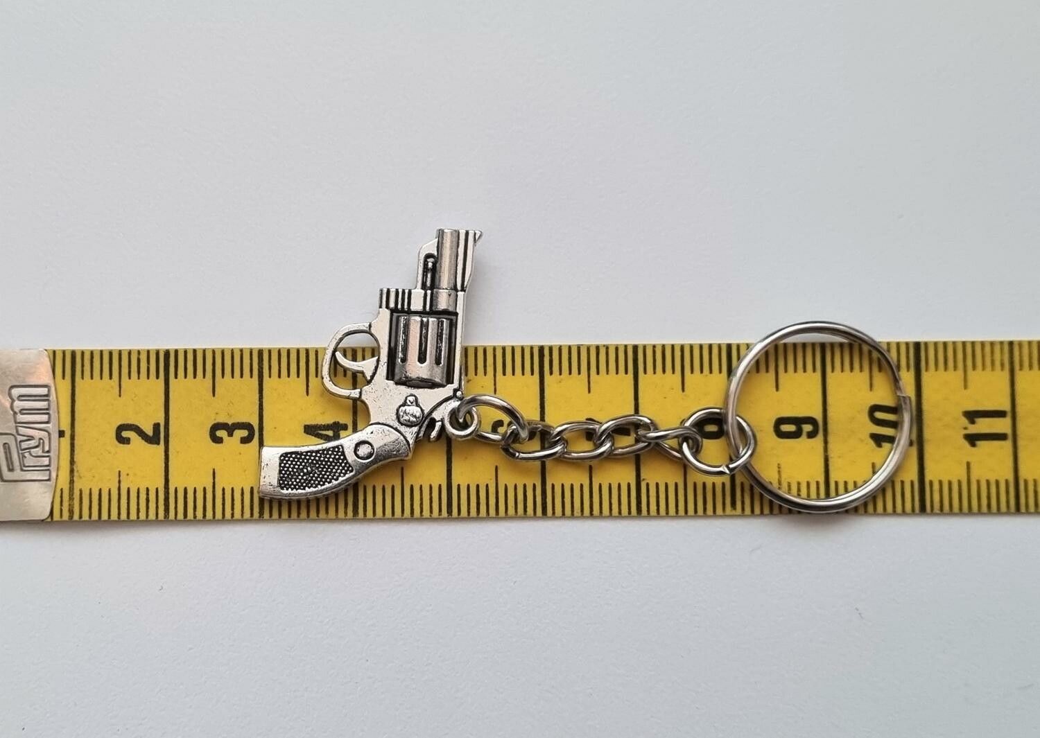 1 st Nyckelring - Silverfärgad revolver